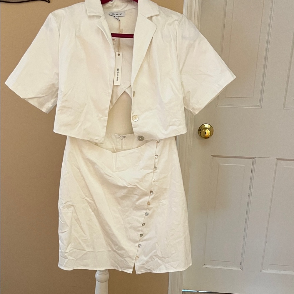 New with tags white cut out dress by Crescent size large
